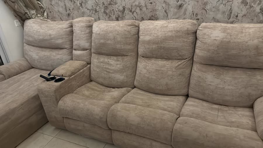 Existing sofa and feature wall at a client home