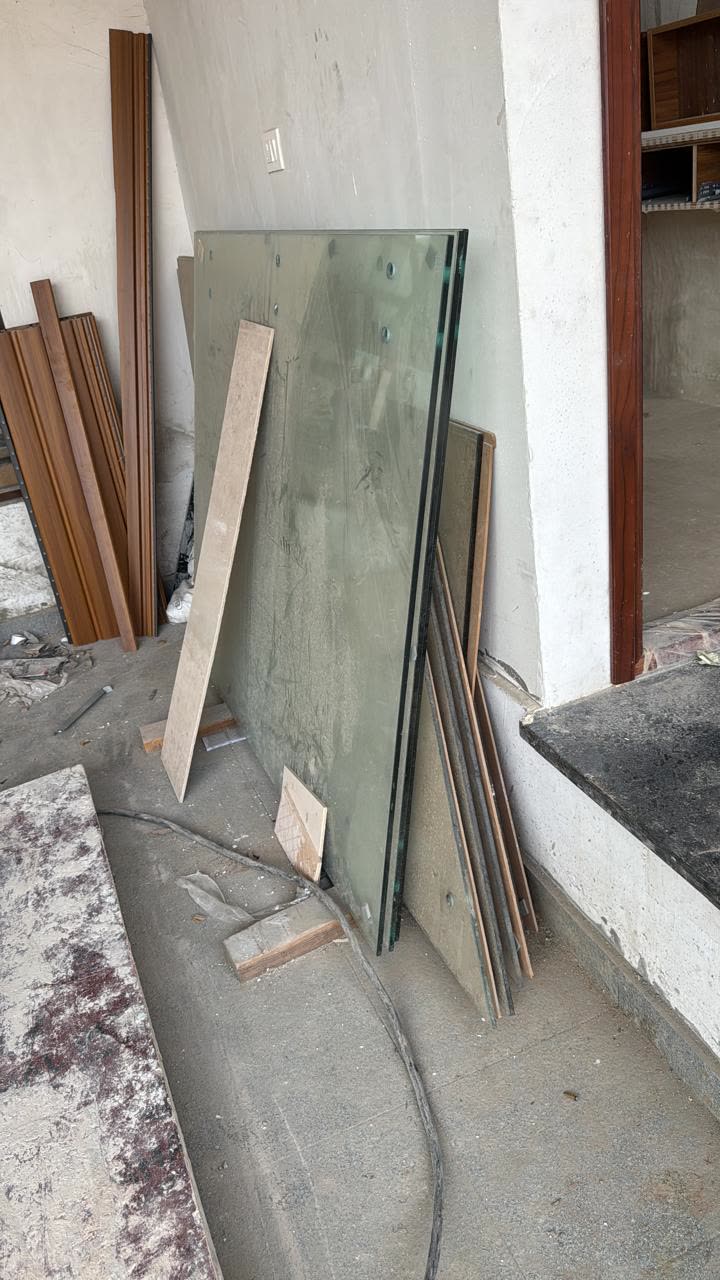 Glass panels and fluted wall panels on site